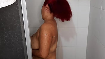 I spy on my stepmother while she takes a bath, I get horny and make her suck cock
